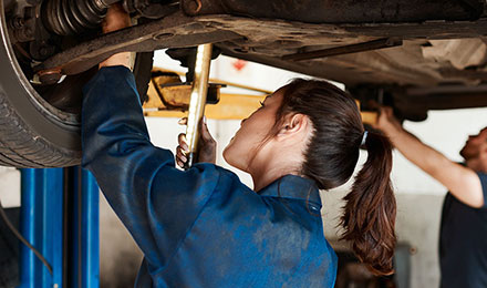 image of mechanic working on vehicle