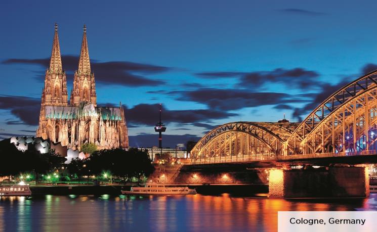 image of building and bridge at dusk in Cologne, Germany