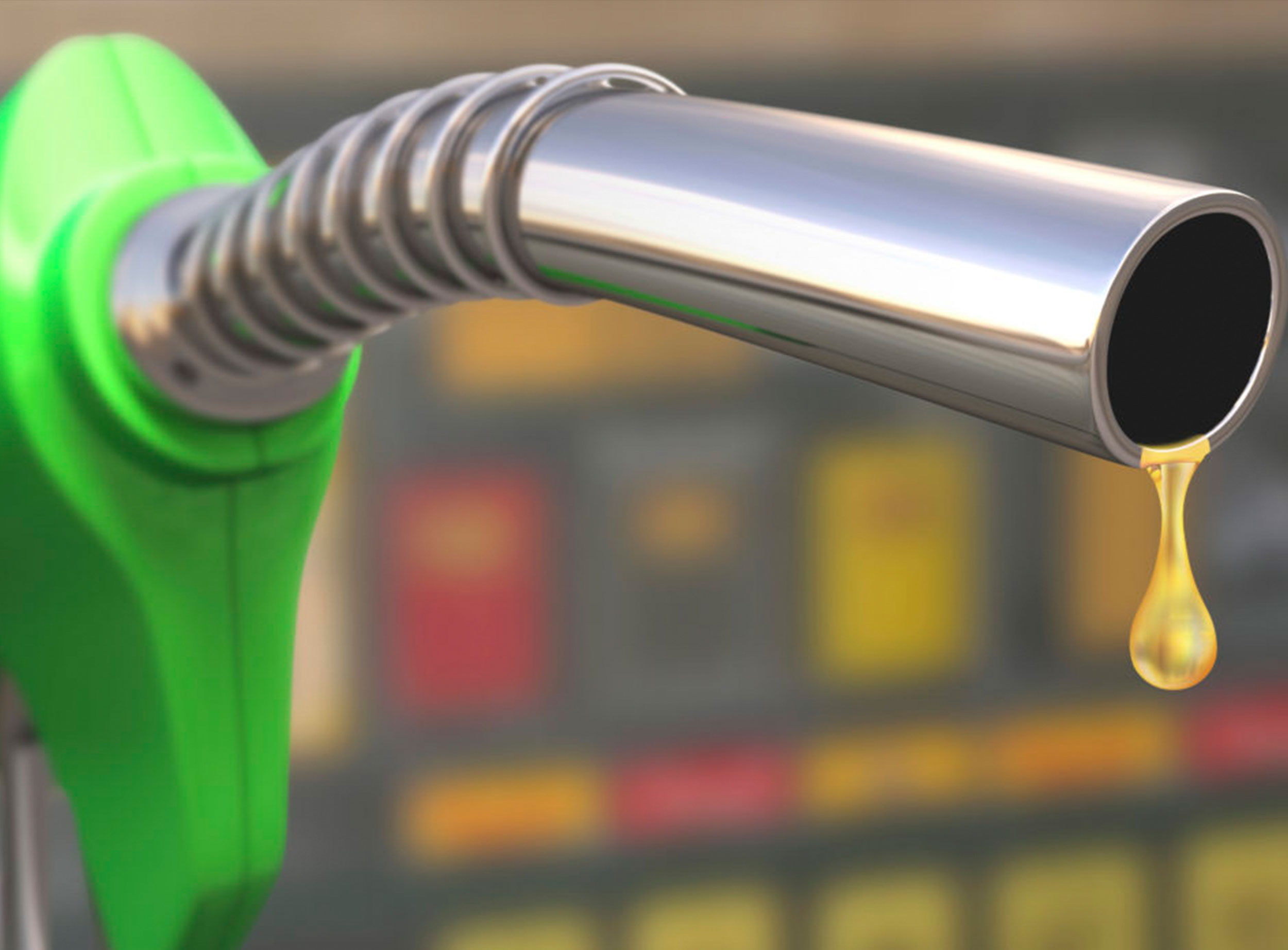 image of gas droplet dripping from green gas pump