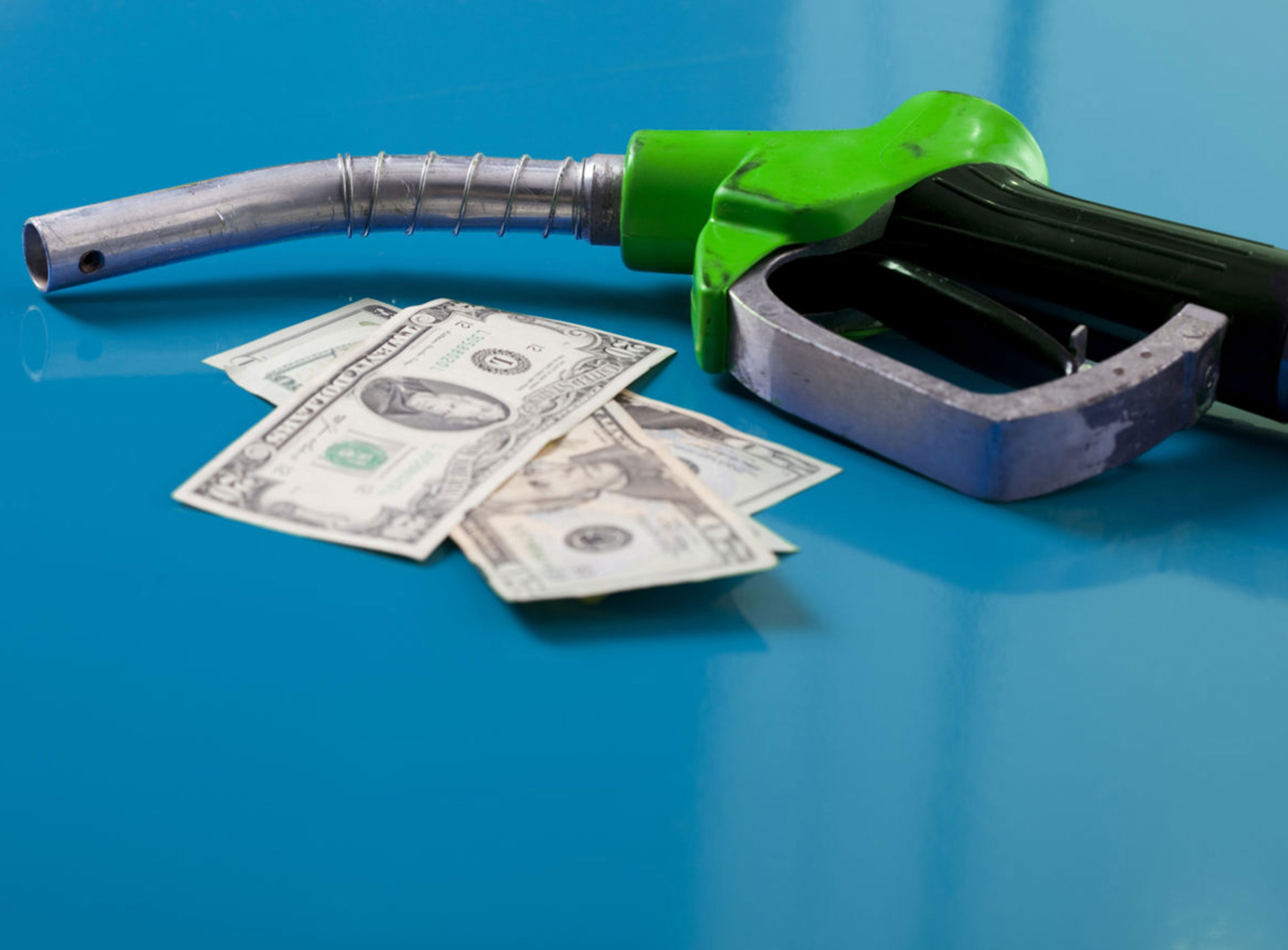 image of gas pump and cash