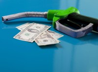 image of gas pump and cash
