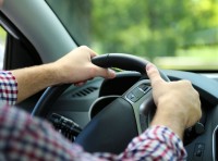 image of man driving vehicle
